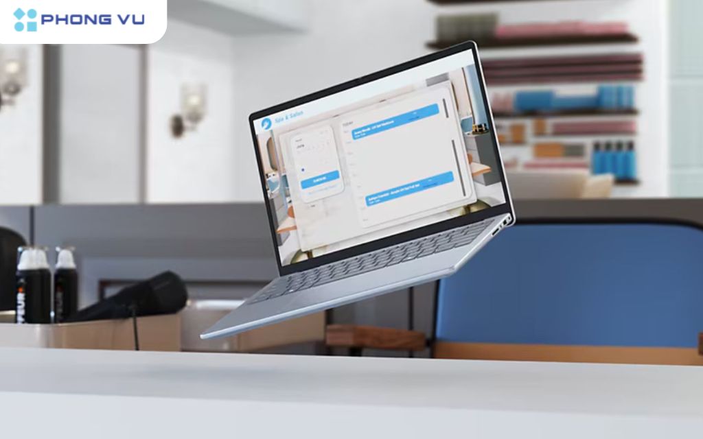 Top 10 laptop văn phòng giá dưới 25 triệu bán chạy nhất tại Phong Vũ 10 Dell Inspiron 5440 G14 - N4I7204W1: Laptop văn phòng gọn nhẹ với chip Intel Core i7, RAM 16GB DDR5, SSD 512GB, màn hình 14 inch FHD+ cùng âm thanh Dolby Atmos.