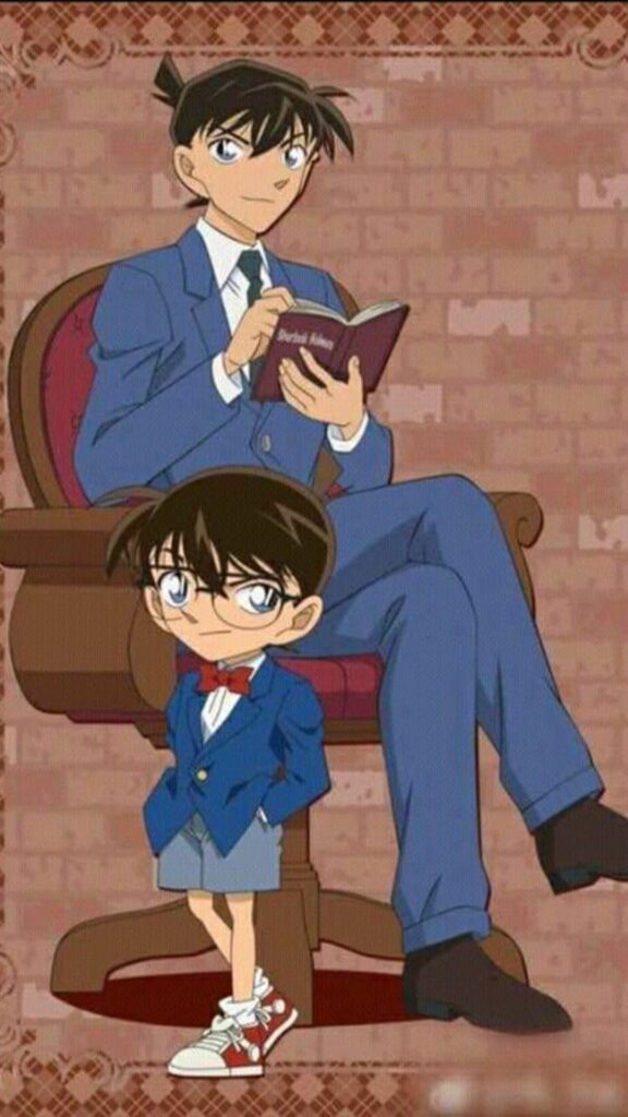 Shinichi ngồi suy nghĩ cùng Conan bên cạnh