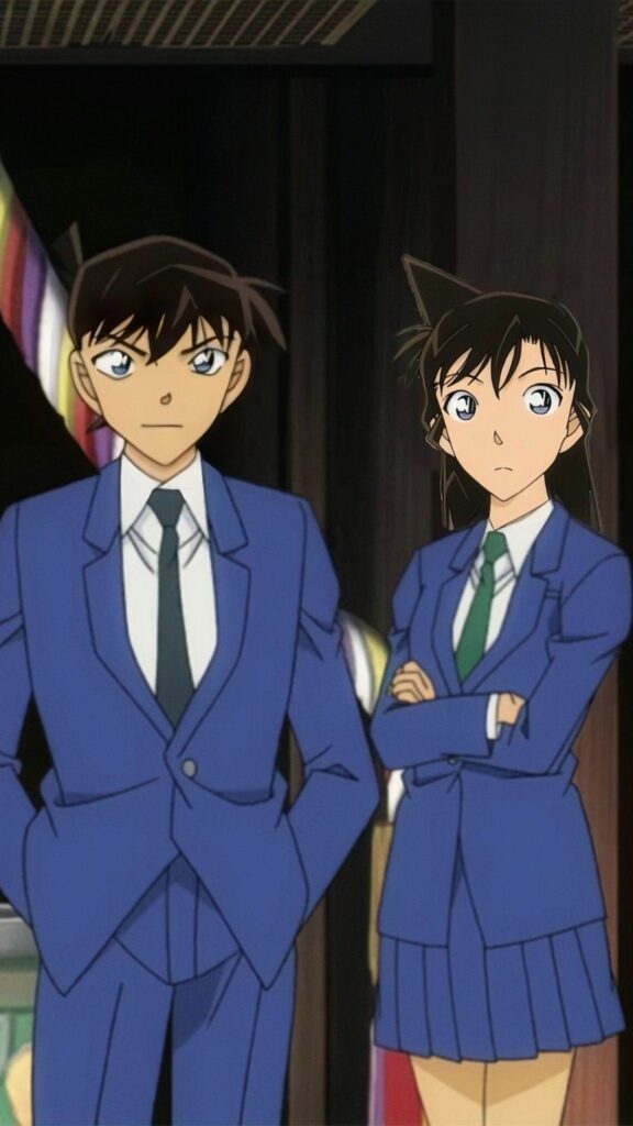 Shinichi và Ran đứng cạnh nhau lặng lẽ