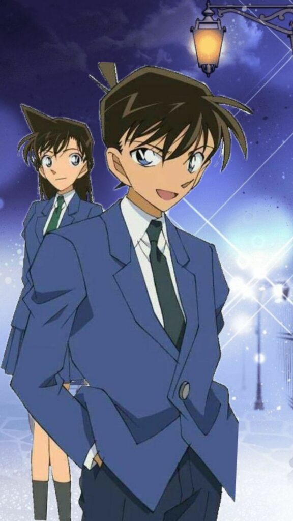 Shinichi đứng cạnh Ran trong khung cảnh đêm